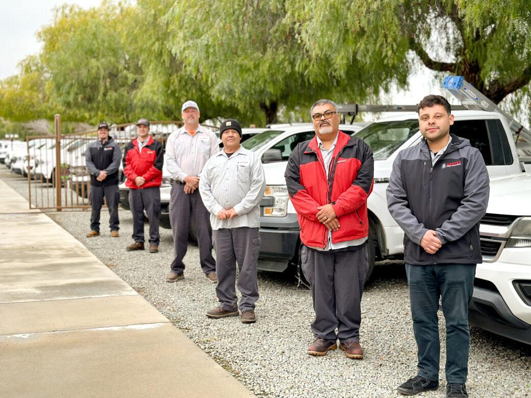 Aantex Pest Control Team in Front of Trucks